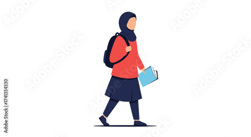 Young Muslim female student in a hijab walking with a backpack and carrying books.