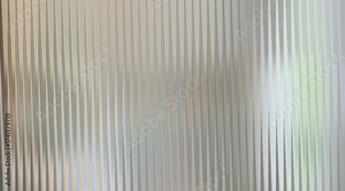 Abstract textured background with vertical ribbed pattern and soft light