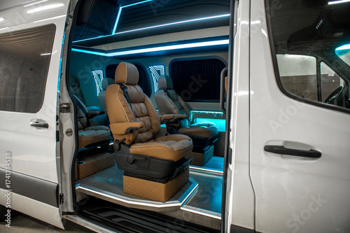 Comfortable interior of a passenger bus with soft seats