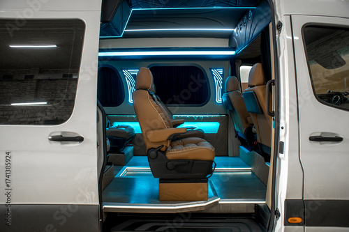 Comfortable interior of a passenger bus with soft seats