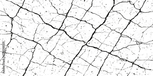 An old, dry cracked concrete wall with a pattern resembling arid earth