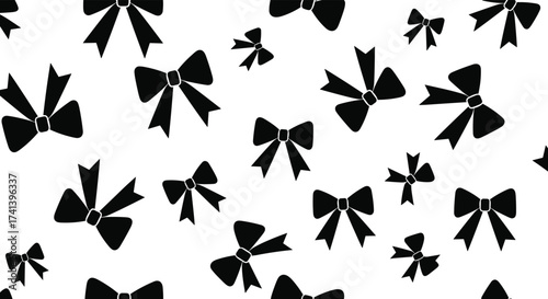 A charming pattern of black bows scattered across a white background ideal for gift wrapping