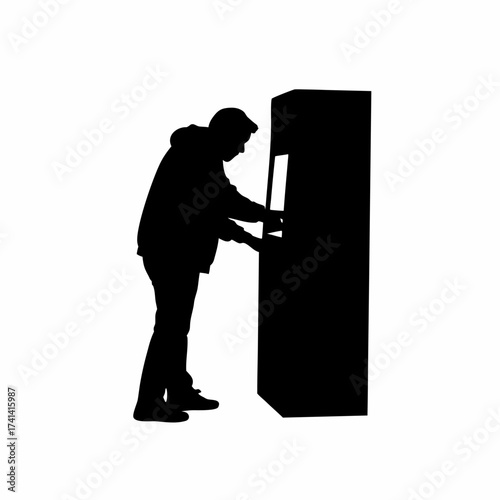 Silhouette of a man using an atm to withdraw cash isolated on white background