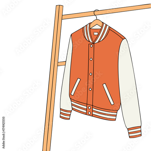 A bright orange and white varsity jacket hangs centered on a wooden clothes rack. The jacket, with white sleeves and striped cuffs, is buttoned. 