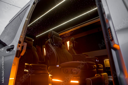 Comfortable interior of a passenger bus with soft seats