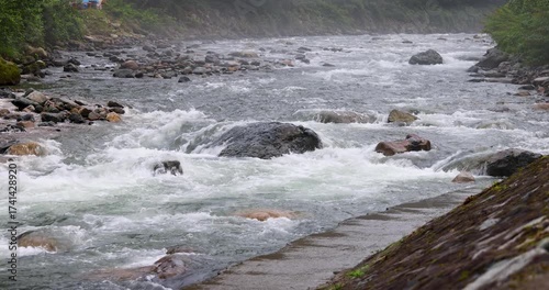 8K horizontal macro view of Fırtına River rapids crashing over rocks. The dynamic water movement shows the raw power and rhythm of untouched Turkish nature