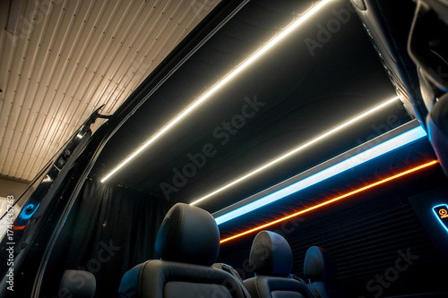 Comfortable interior of a passenger bus with soft seats