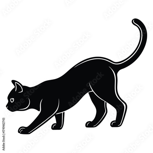 Black cat silhouette in a stalking position