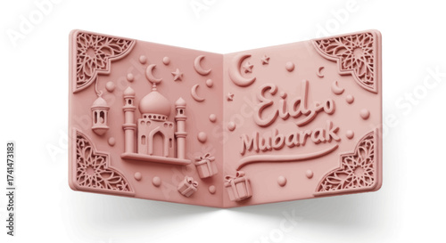 A pink book-shaped Eid Mubarak decorative plaque with a bas-relief mosque and calligraphy.