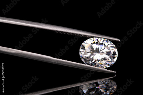 A diamond is displayed in a diamond setting