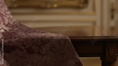 Elegant flowing damask fabric with ornate pattern and subtle shimmer