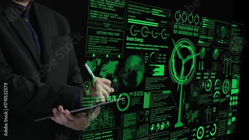 Billede på lærred A business professional engages with a digital green energy dashboard showcasing data visuals, aiming for sustainability and innovation in energy solutions