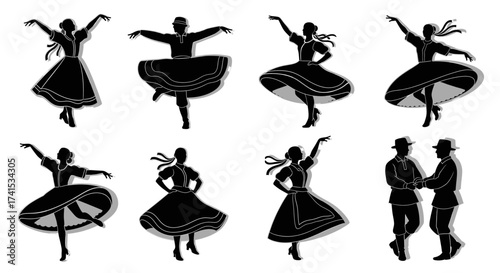 Silhouettes of dancers in traditional folk costumes