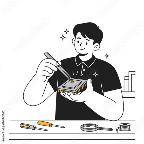 Young man repairing device with screwdriver at home workspace  