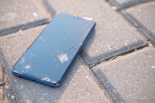 A smartphone with a broken screen