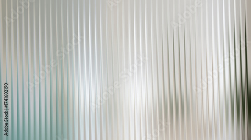 Abstract background with vertical ribbed texture and soft light