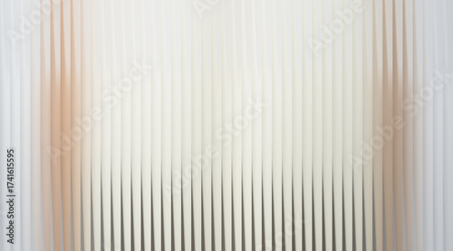 Abstract vertical lines with soft peach and white tones