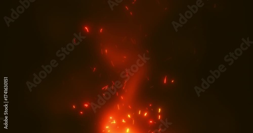 A mesmerizing footage with flames and smoke from a fire, with sparks flying in the air. Perfect for projects related to nature, adventure and comfort.