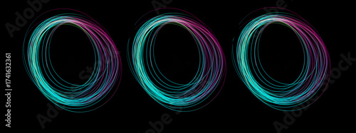 Wallpaper Mural Three swirling circles of colorful light created using freeze light, capturing movement and energy in a dark setting Torontodigital.ca