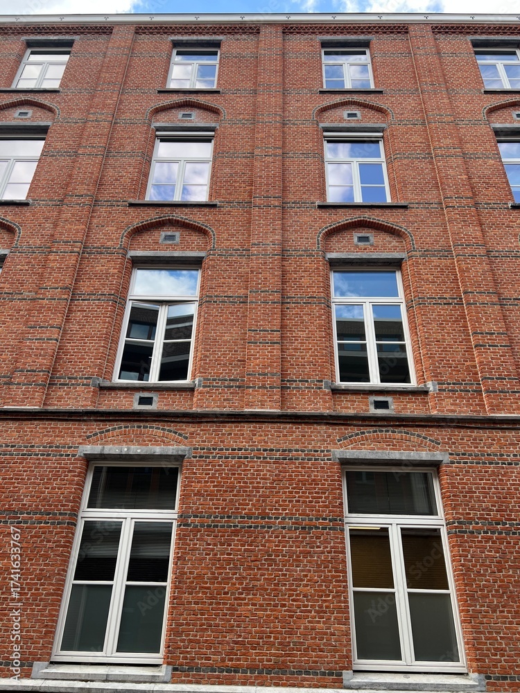 Naklejka premium Red brick building facade