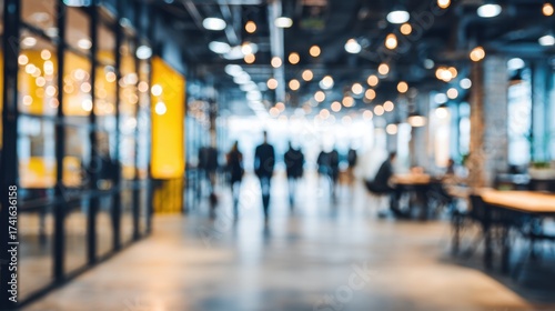 Modern Open Office Interior with Business People Walking in Bright Coworking Space