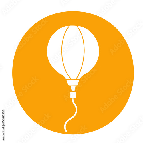Silhouette of a balloon, negative space on an orange circle background for celebration concept