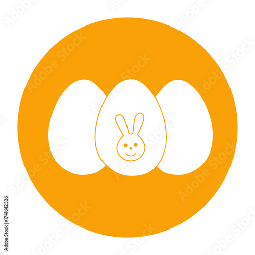 Silhouette of decorated Easter eggs with a bunny face, negative space on an orange circle background for celebration concept