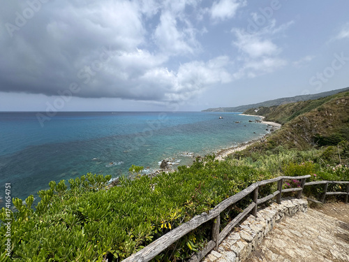 Wallpaper Mural southern Italy, Calabria, Mediterranean coast, beach, sea, oleanders and greenery Torontodigital.ca