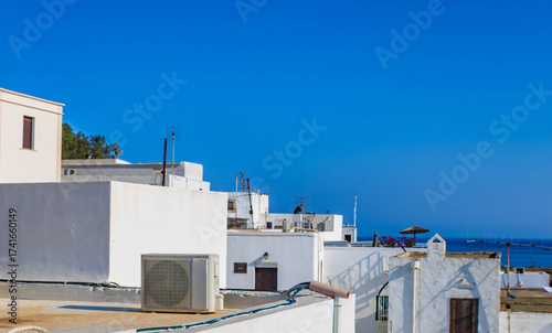 Close up of white houses with flat roofs against the blue sky, Lindos, Rhodes, Greece