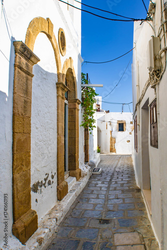 Beatiful narrow alley with whitewashed walls, Lindos, Rhodes, Greece