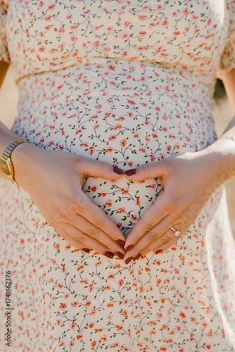 Expecting Mother Embracing Baby Bump