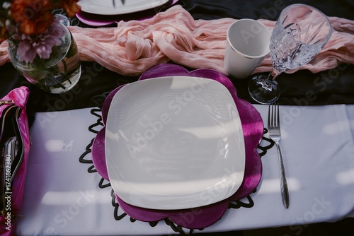Elegant Table Setting with Pink and Purple Accents