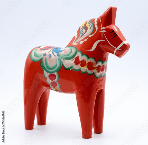 Swedish dala horse. Typical souvenir from Sweden. Made of wood and painted in mostly red.