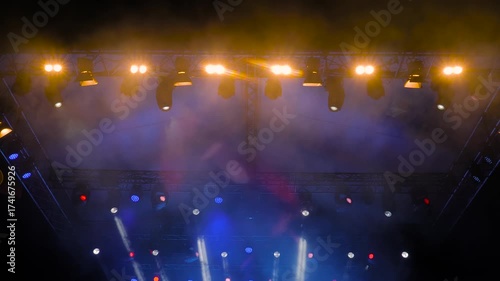 Colorful bright dynamic concert lighting for stage at nightclub. Illumination for entertainment, musical shows, parties, or performances at night. Nightlife, music, and entertainment concept