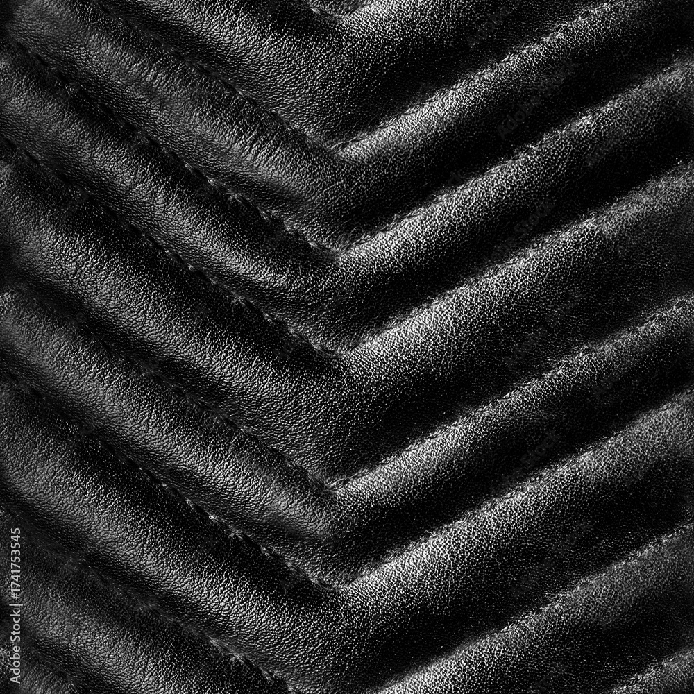 Fototapeta premium Seamless 4k photo texture material of ornate quilted black leather surface.