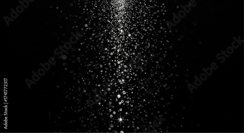 A dazzling light waterfall cascades dramatically against the solid backdrop of a night sky. The captivating image showcases a magical dance of illumination.