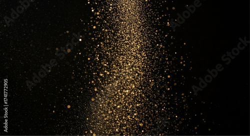 A cascade of sparkling golden particles, elegantly suspended against a stark black background, forms a captivating abstract design. Evoking a sense of luxury and timeless elegance.