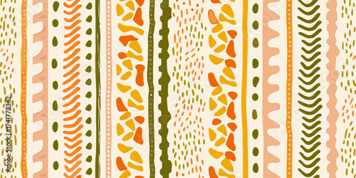 Abstract organic shapes and dotted patterns in warm earthy tones create a boho tribal stripe seamless background