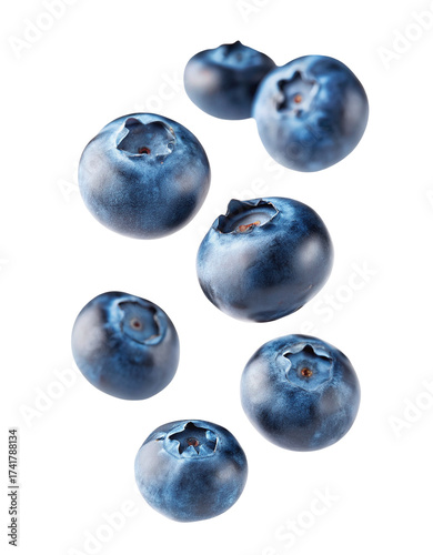 Fresh ripe blueberries scattered naturally isolated for a delicious sweet treat