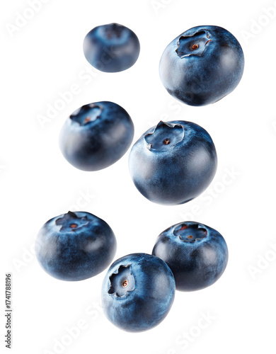 Fresh blueberries scattered mid-air high-quality food photography studio shot