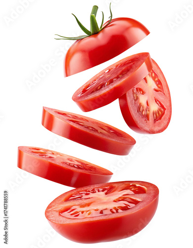Fresh ripe tomato slices suspended in mid-air close-up shot
