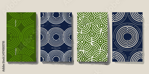 Set of four abstract geometric patterns on book covers in green and navy blue