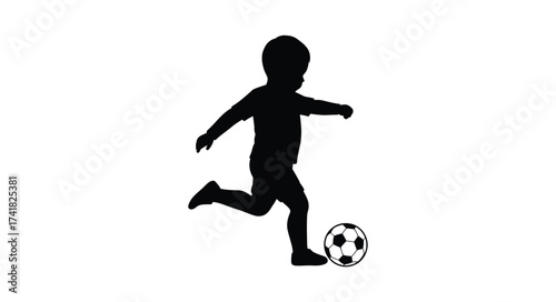 Silhouette of a young child kicking a soccer ball in a dynamic pose celebrating childhood active play and sports