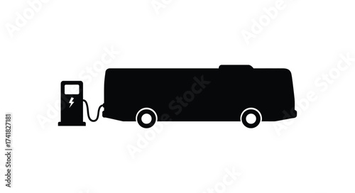 Silhouette of a bus refueling at a gas station providing transportation energy and fuel services for public and private transit