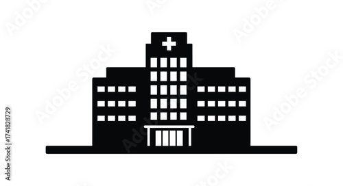 Modern hospital building with multiple floors and large entrance featuring a prominent plus sign symbol representing healthcare and medical services