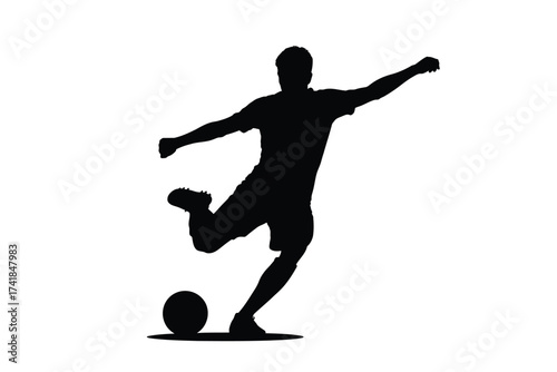 Black silhouette of a soccer player kicking a ball football