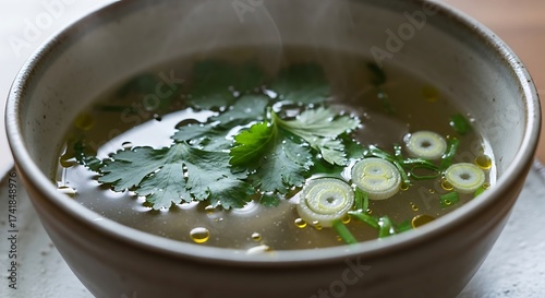 Delicious broth with fresh herbs and vegetables.