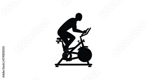 Silhouette of a person cycling intensely on a stationary exercise bike promoting indoor fitness and aerobic training