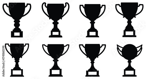 Collection of eight silhouetted trophy icons representing victory achievement and success on a clean surface