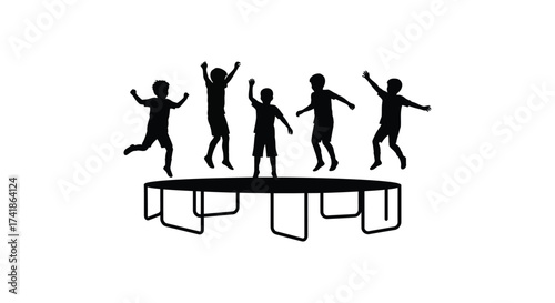 Joyful silhouettes of children happily jumping and playing on a trampoline outdoors